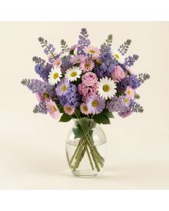 Lilacs And Daisies Mixed Floral Arrangement In Glass Vase (synthetic illustration; no displayed measurements)