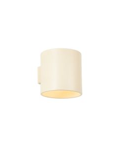 Stone Crest Wall Sconce Mounted On A Plain Wall - Ivory