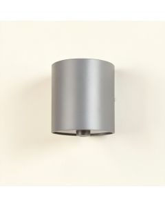 Vale Crossing Wall Sconce Mounted On A Plain Wall - Gray (synthetic illustration; no displayed measurements)