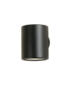 Field Arc Wall Sconce Mounted On A Plain Wall