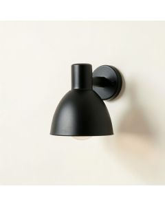 Aspen Bend Wall Sconce Mounted On A Plain Wall - Black (synthetic illustration; no displayed measurements)