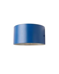 Juniper Crest Wall Sconce Mounted On A Plain Wall - Blue