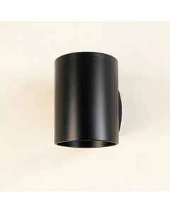 Slate Arc Wall Sconce Mounted On A Plain Wall - Black (synthetic illustration; no displayed measurements)