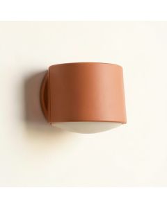 Fern Crossing Wall Sconce Mounted On A Plain Wall - Terracotta (synthetic illustration; no displayed measurements)