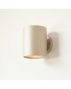 Olive Crossing Wall Sconce Mounted On A Plain Wall - Beige (synthetic illustration; no displayed measurements)