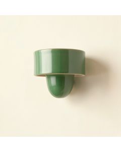 Spruce Dale Wall Sconce Mounted On A Plain Wall - Green (synthetic illustration; no displayed measurements)