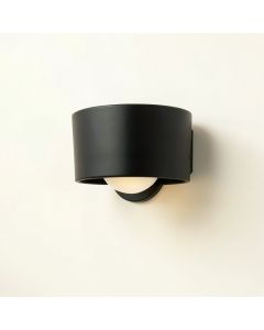 Flint Branch Wall Sconce Mounted On A Plain Wall - Black (synthetic illustration; no displayed measurements)