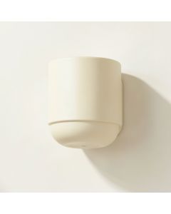 Dune Dell Wall Sconce Mounted On A Plain Wall - Ivory (synthetic illustration; no displayed measurements)