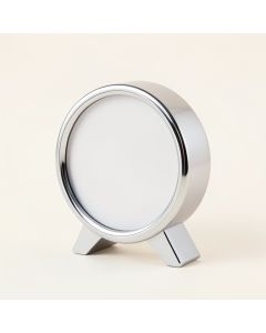 Chrome Clock And Thermometer (synthetic illustration; no displayed measurements)