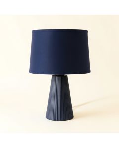 Clay Arc Table Lamp With A Plain Fabric Shade (synthetic illustration; no displayed measurements)