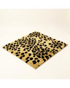 Thornbury Animal Print Tufted Wool Gold/Black Area Rug (synthetic illustration; no displayed measurements)