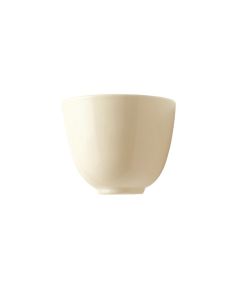 Dune Crest Wall Sconce Mounted On A Plain Wall - Cream