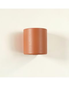 Summit Crest Wall Sconce Mounted On A Plain Wall - Terracotta (synthetic illustration; no displayed measurements)