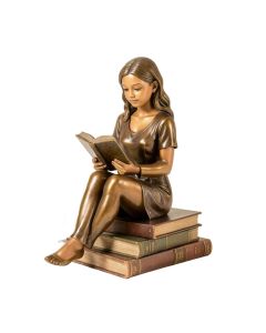 Girl Sitting On Books And Reading Statue