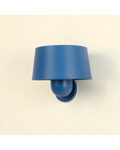 Stone Bridge Wall Sconce Mounted On A Plain Wall - Blue (synthetic illustration; no displayed measurements)