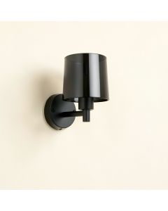 Heath Arc Wall Sconce Mounted On A Plain Wall (synthetic illustration; no displayed measurements)