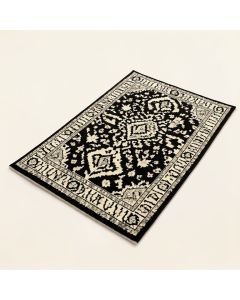 Burford Bohemian Ikat Black / Ivory Area Rug (synthetic illustration; no displayed measurements)