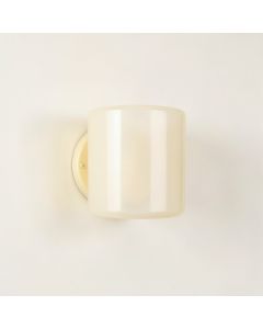 Stone Canyon Wall Sconce Mounted On A Plain Wall - Ivory (synthetic illustration; no displayed measurements)