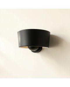 Cove Arc Wall Sconce Mounted On A Plain Wall (synthetic illustration; no displayed measurements)