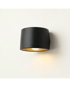 Dune Bend Wall Sconce Mounted On A Plain Wall - Black (synthetic illustration; no displayed measurements)