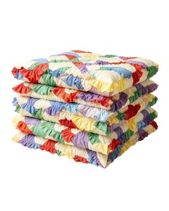 Ruffled Garden Reversible Quilt Set (synthetic illustration; no displayed measurements)