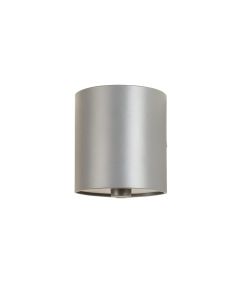 Vale Crossing Wall Sconce Mounted On A Plain Wall - Gray
