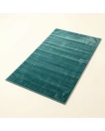 Poynor Hand-Tufted Teal Indoor/Outdoor Area Rug (synthetic illustration; no displayed measurements)
