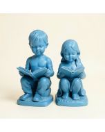 Braylen A Boy And A Girl Reading A Book 2 Piece Statue Set (synthetic illustration; no displayed measurements)